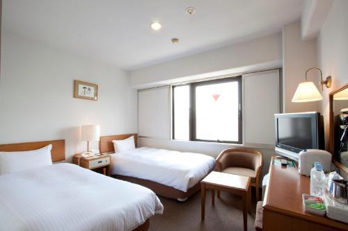 Smile Hotel Sugamo - Tap to explore photos