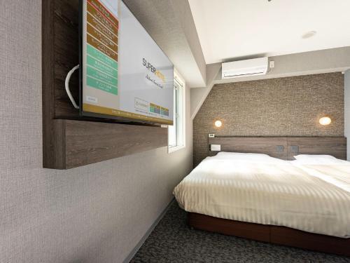 SUPER HOTEL Ikebukuro West Natural Hot Spring - Tap to explore photos