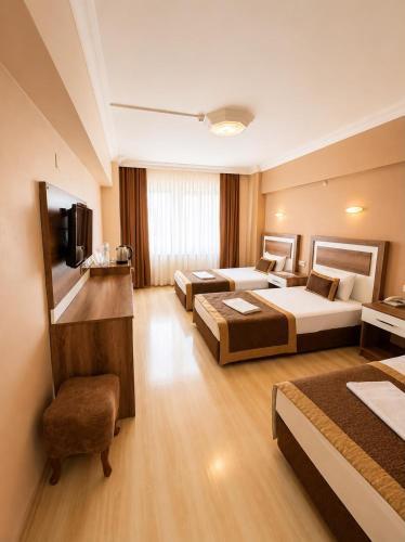 Dempa Hotel Room Type - Comfort Triple Room Dempa Hotel Room Type - Comfort Triple Room