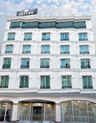 The Grand Mira Hotel - Tap to explore photos