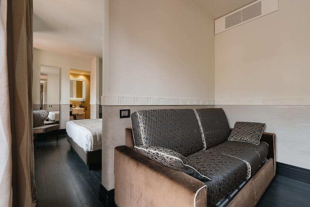 Unica Suites Rome - Tap to explore photos