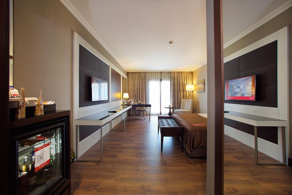 Ramada Hotel & Suites by Wyndham Istanbul Merter - Tap to explore photos