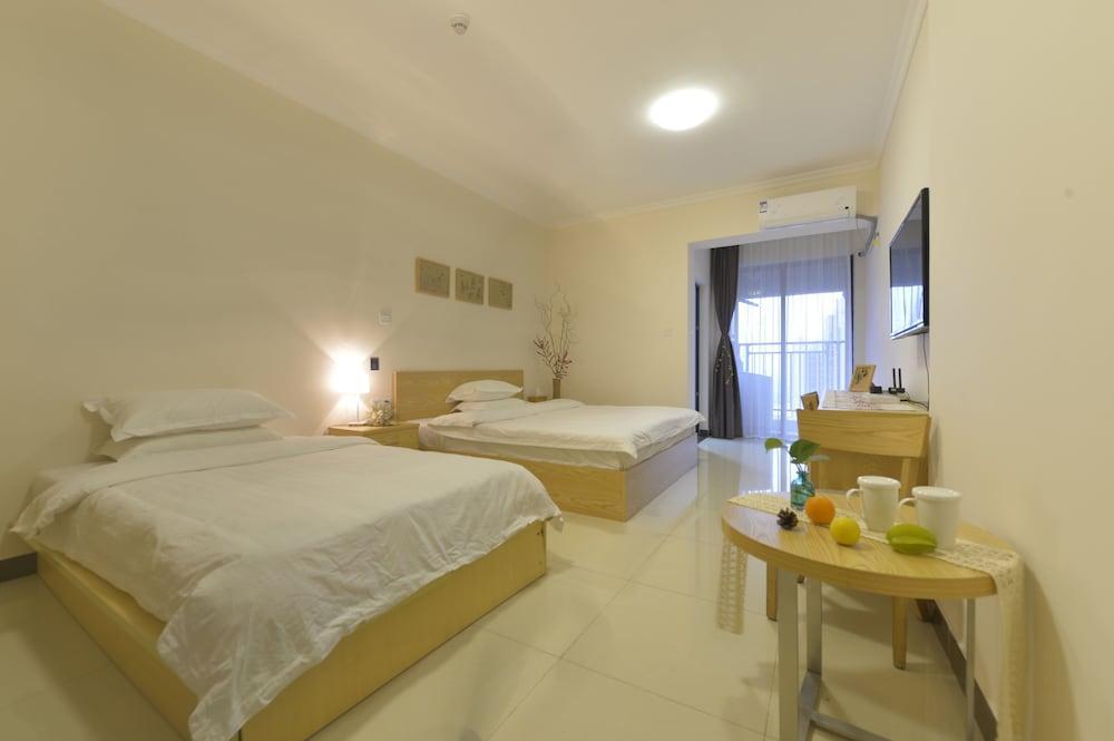 Xizhengjia Apartment Hotel (Guangzhou Pazhou Convention and Exhibition Center) - Tap to explore photos