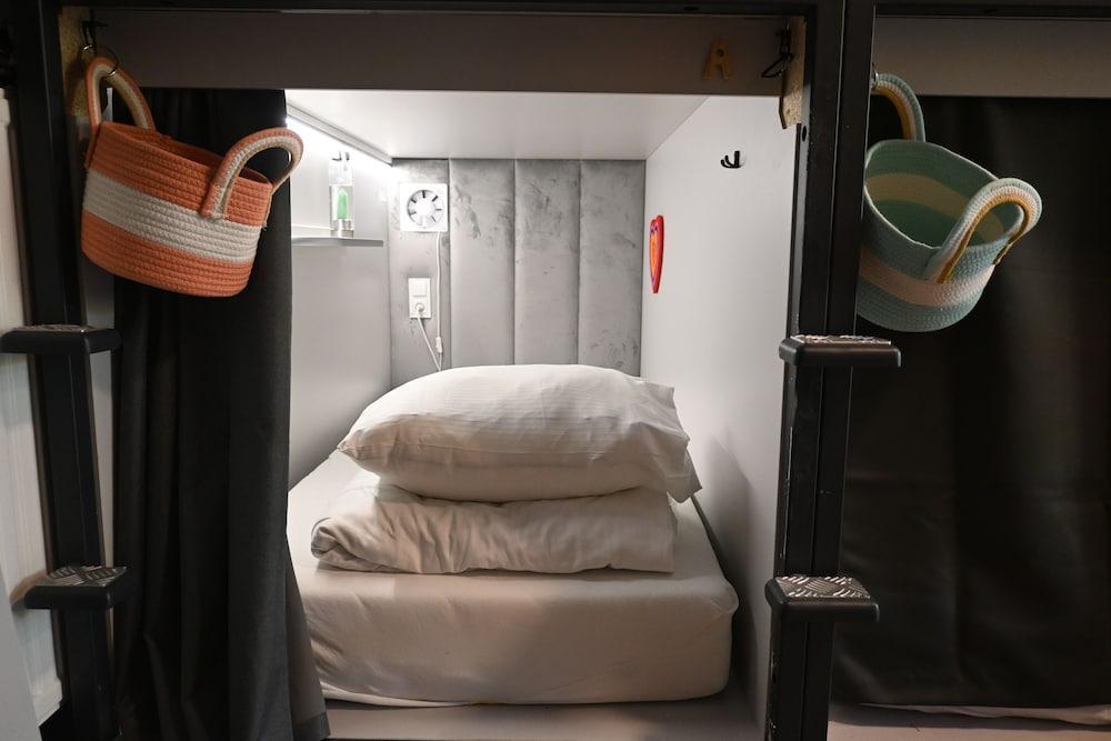 Dutchies Hostel Room Type - Single Capsule in a room with other capsules