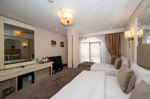 The Barbarossa Hotel Room Type - Triple Room with French Balcony The Barbarossa Hotel Room Type - Triple Room with French Balcony