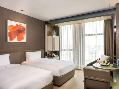 Novotel Shanghai Clover - Tap to explore photos