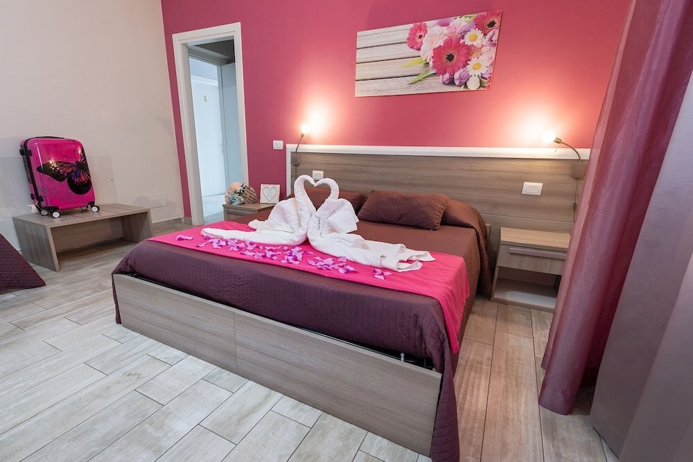 Suite Room Fiumicino - Tap to explore photos