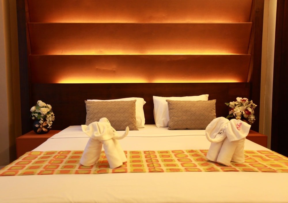 The Bangkok Major Suite - Tap to explore photos