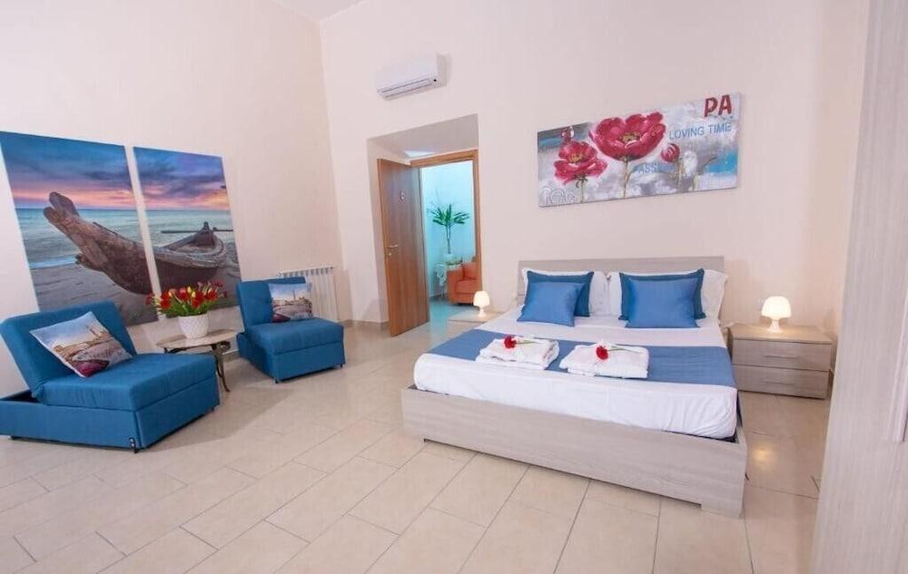 Alloggio Turistico Port View Room Type - Quadruple Room, Private Bathroom (External) Alloggio Turistico Port View Room Type - Quadruple Room, Private Bathroom (External)