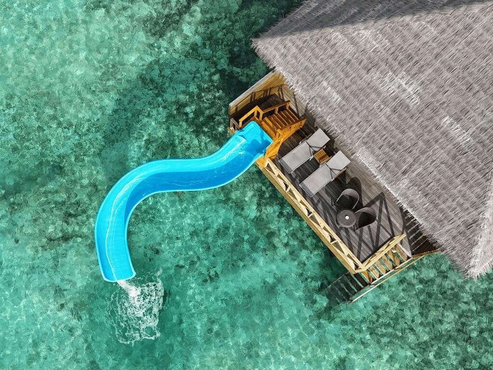 Cocoon Maldives - All-inclusive Room Type - Lagoon Suite with Slide