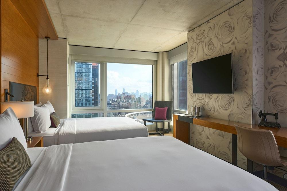 Renaissance New York Midtown Hotel by Marriott - Tap to explore photos