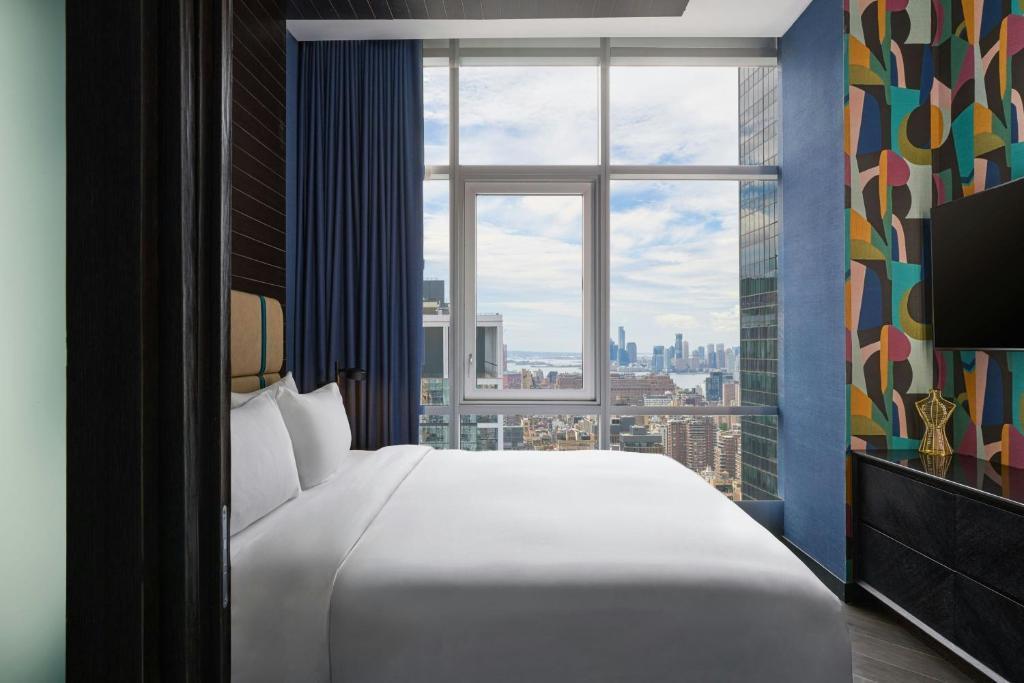 Renaissance New York Midtown Hotel by Marriott - Tap to explore photos