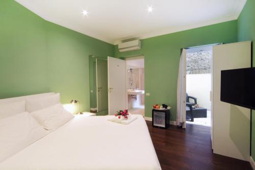 The One Prati Rooms - Tap to explore photos