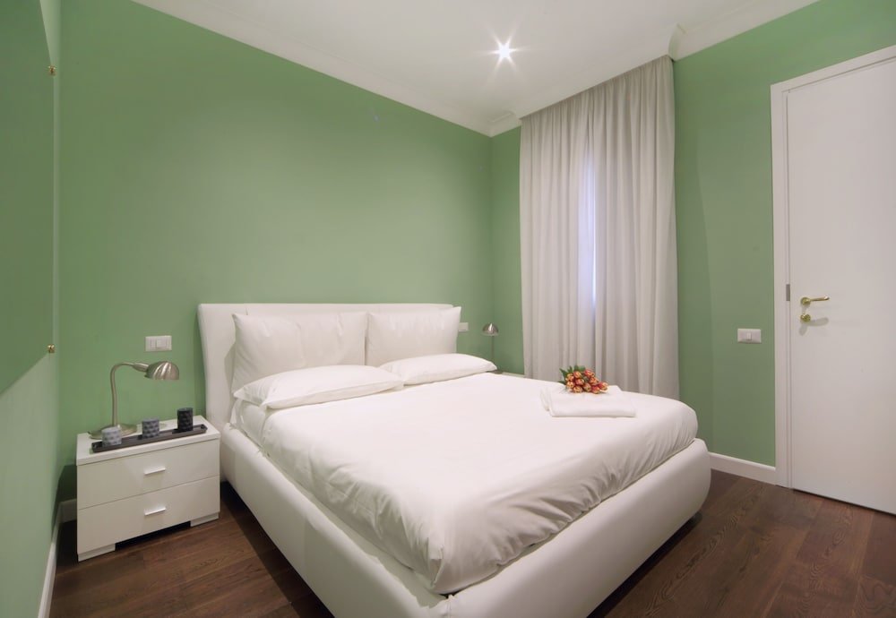 The One Prati Rooms - Tap to explore photos