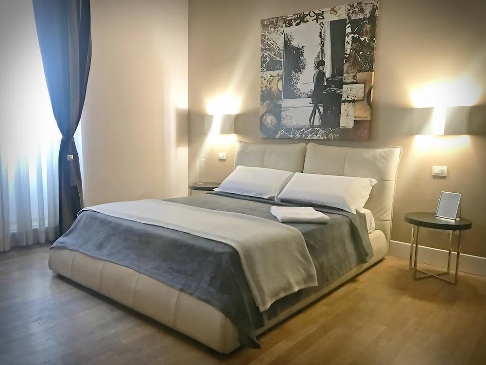 Cardilli Luxury Rooms - Tap to explore photos