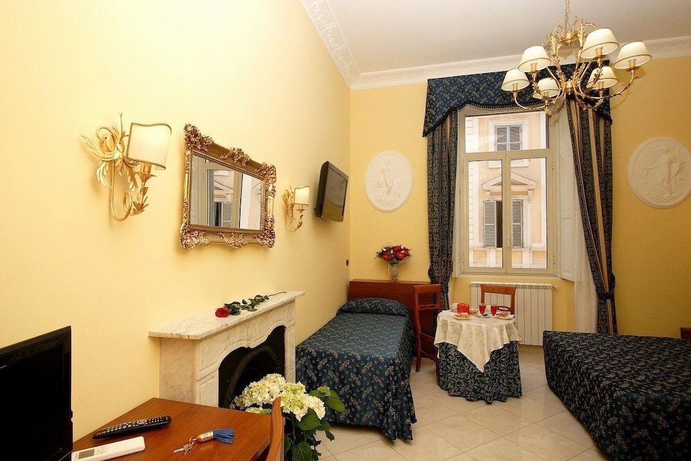 Caroline Suite Room Type - Triple Room Caroline Suite Room Type - Triple Room