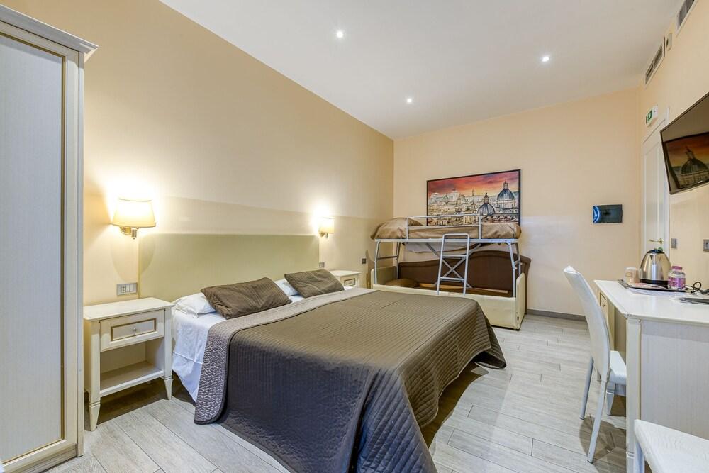 Catone Vatican Suites - Tap to explore photos