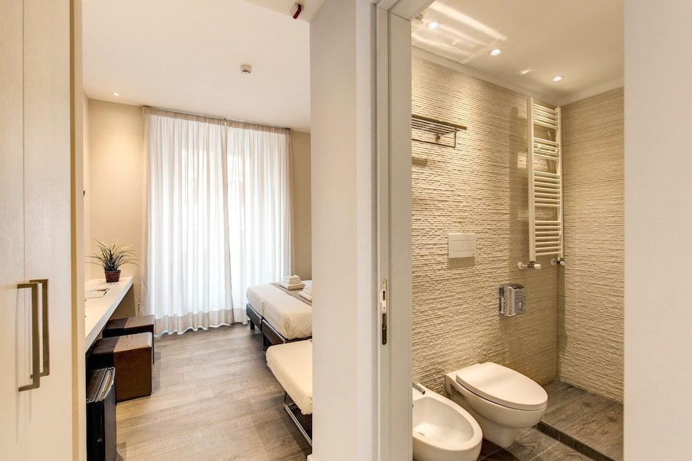 Ecce Roma Suites - Tap to explore photos