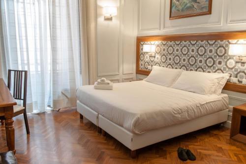Navona Central Suites - Tap to explore photos