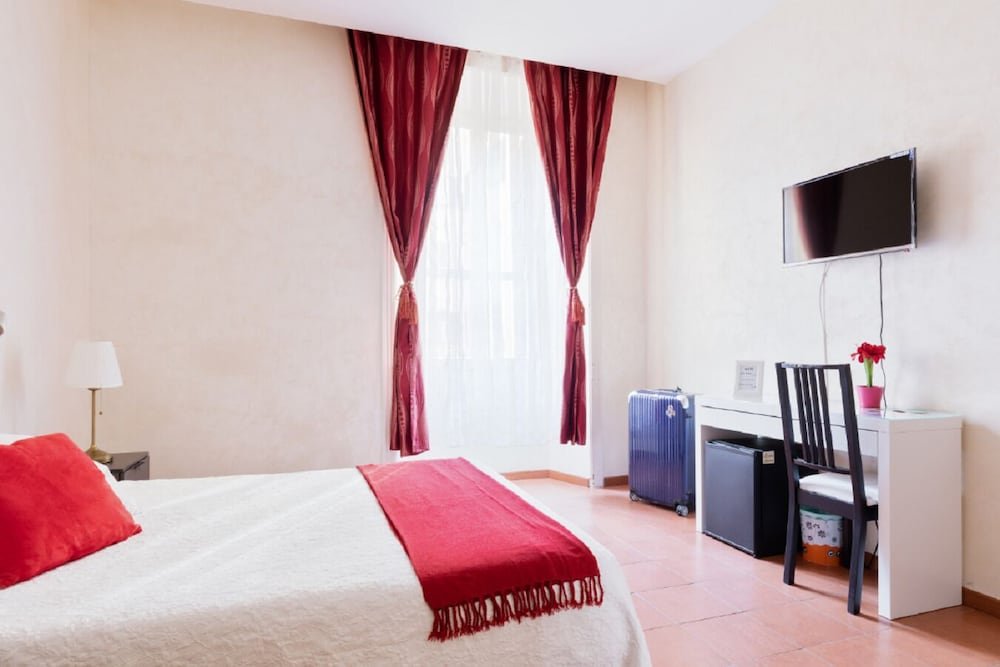 Roma Enrico Guesthouse - Tap to explore photos