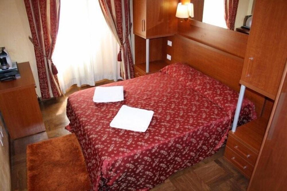 Roma Termini Inn - Tap to explore photos