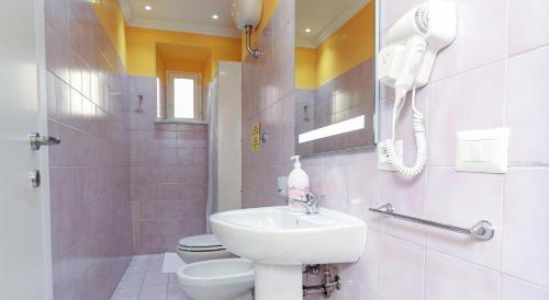 Termini Suites - Tap to explore photos