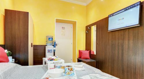 Termini Suites - Tap to explore photos