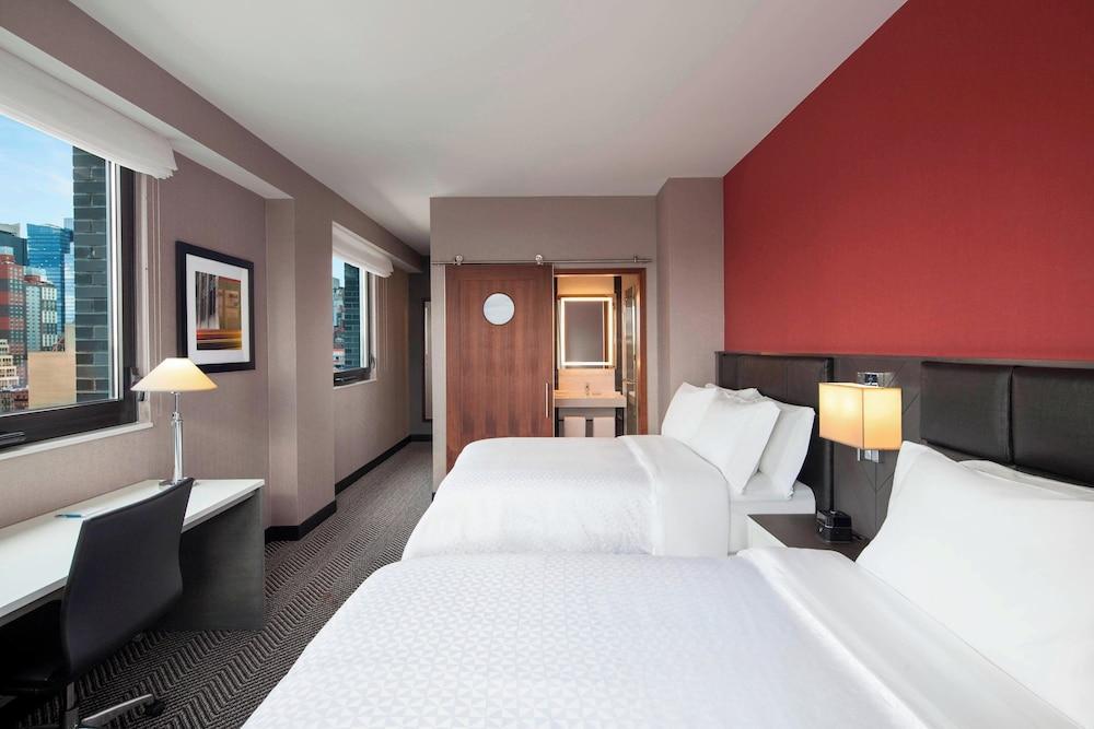 Four Points By Sheraton Manhattan Midtown West - Tap to explore photos