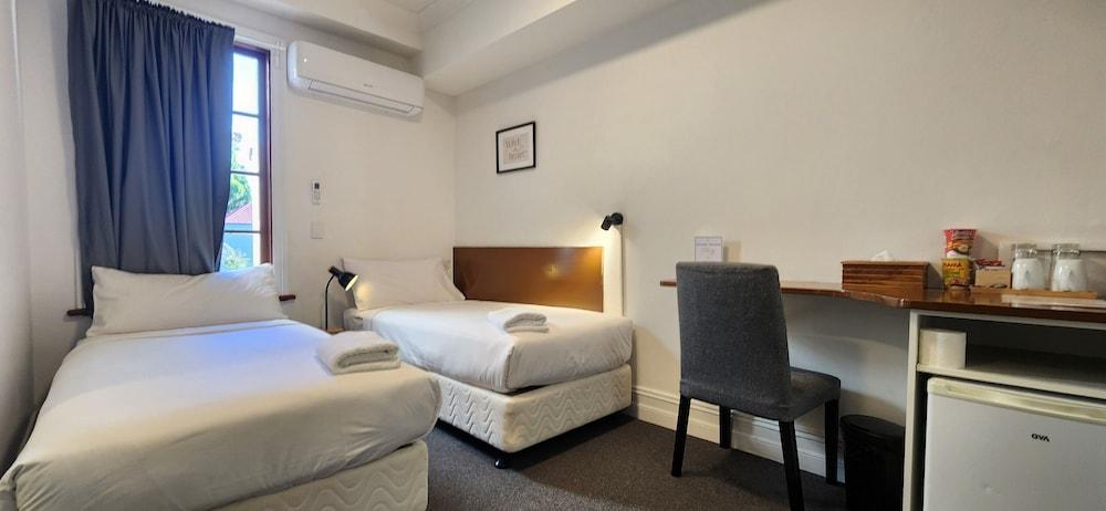 Newtown Cozy Stays Room Type - Twin Room with private Bathroom