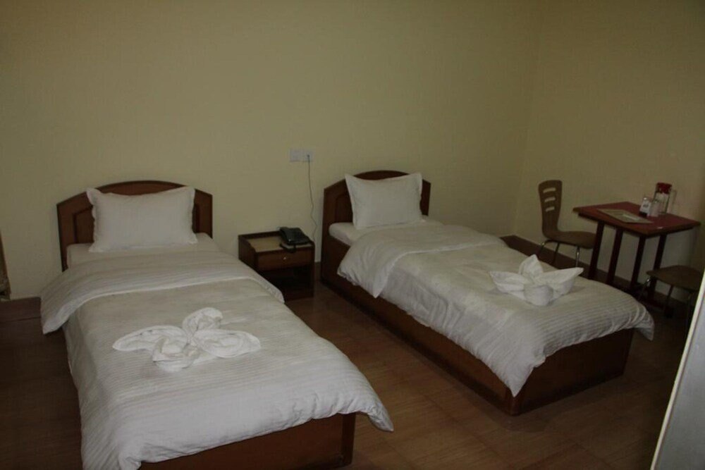 Hotel Milarepa - Tap to explore photos