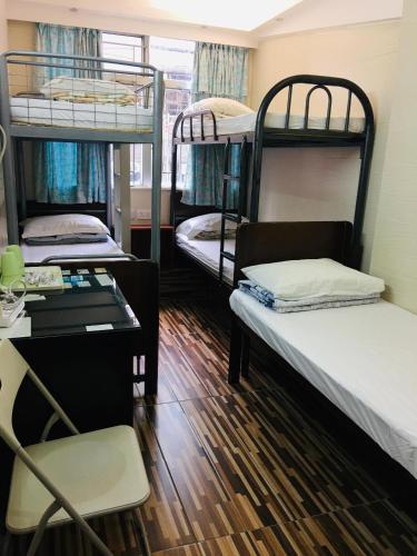 Johnson Hostel Room Type - Family Room with Private Bathroom Johnson Hostel Room Type - Family Room with Private Bathroom