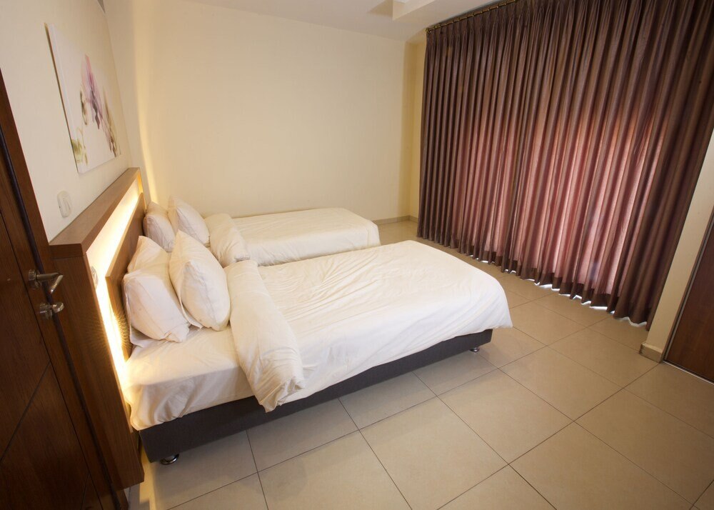 Lujain Hotel Suites - Tap to explore photos