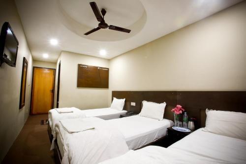 Hotel Nandini - Tap to explore photos