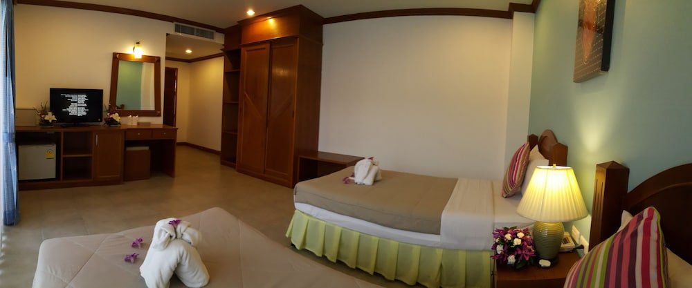 MT Hotel Patong - Tap to explore photos