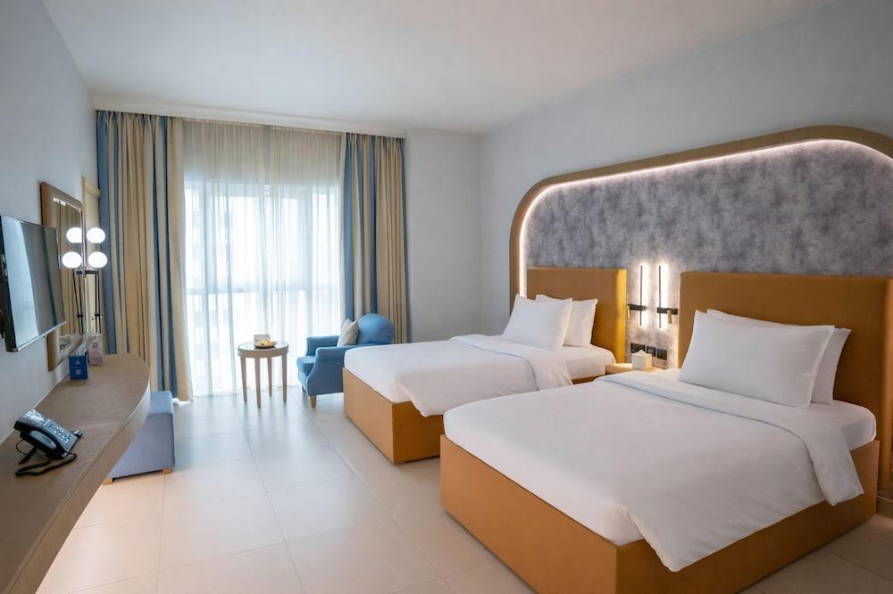 Sheraton Khalidiya Hotel Room Type - Deluxe Twin Room City View