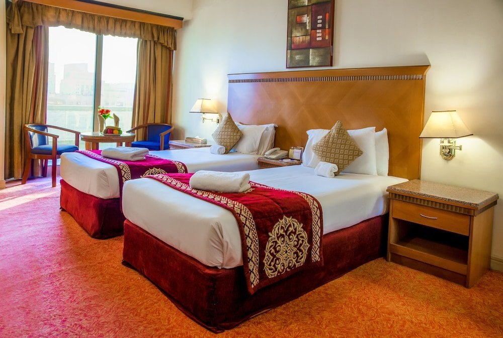 Ramee Guestline Hotel - Tap to explore photos