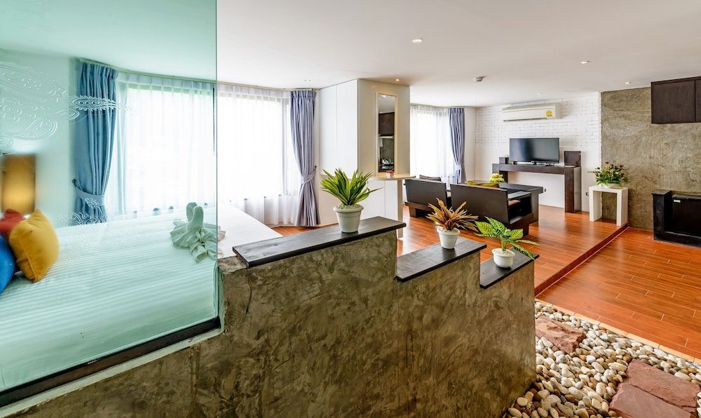 Raha Grand Hotel Patong - Tap to explore photos