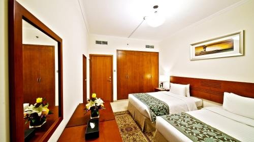 Rose Garden Hotel Apartments Bur Dubai - Tap to explore photos