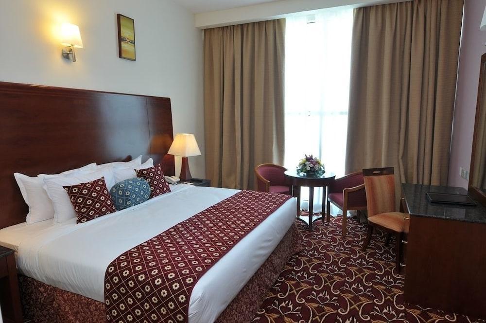 Ramee Rose Hotel - Tap to explore photos