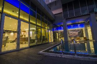 Platinum One Suites - Tap to explore photos