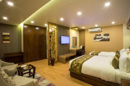 Yatri Suites & Spa - Tap to explore photos