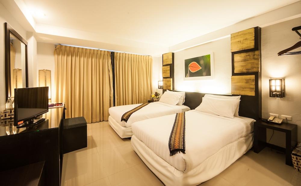 Crystal Inn Phuket - Tap to explore photos