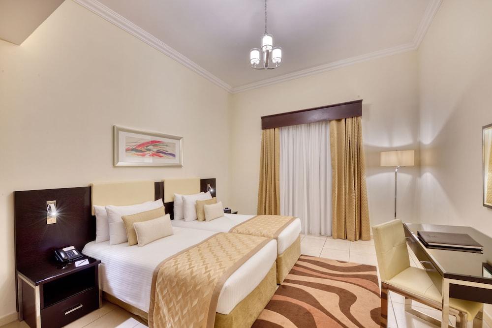 Pearl Marina Hotel Apartments Room Type - Two-bedroom Deluxe city view Apartment with Free Beach Transfer and 15% F&B Discount.