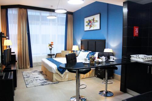 Al Diar Sawa Hotel Apartments - Tap to explore photos
