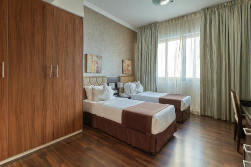City Premiere Marina Deluxe Hotel Apartments - Tap to explore photos