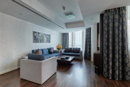 City Premiere Marina Deluxe Hotel Apartments - Tap to explore photos