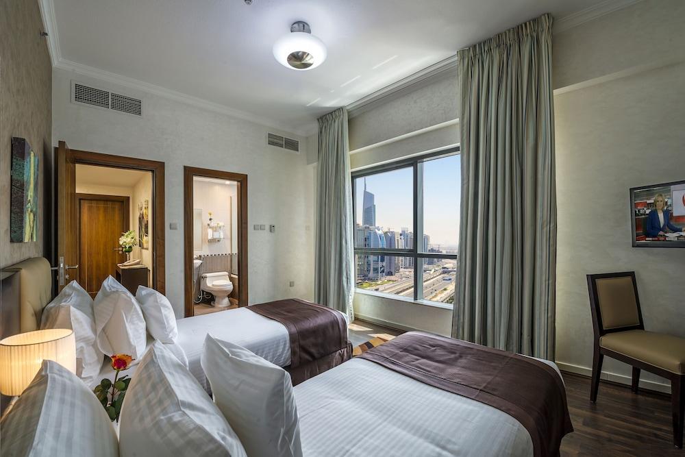 City Premiere Marina Deluxe Hotel Apartments - Tap to explore photos