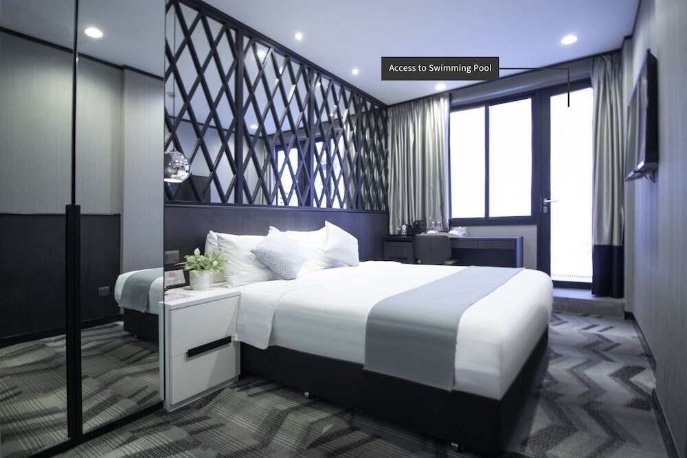 Hotel NuVe Urbane - A Boutique Hotel Room Type - Deluxe Queen Pool Access Hotel NuVe Urbane - A Boutique Hotel Room Type - Deluxe Queen Pool Access