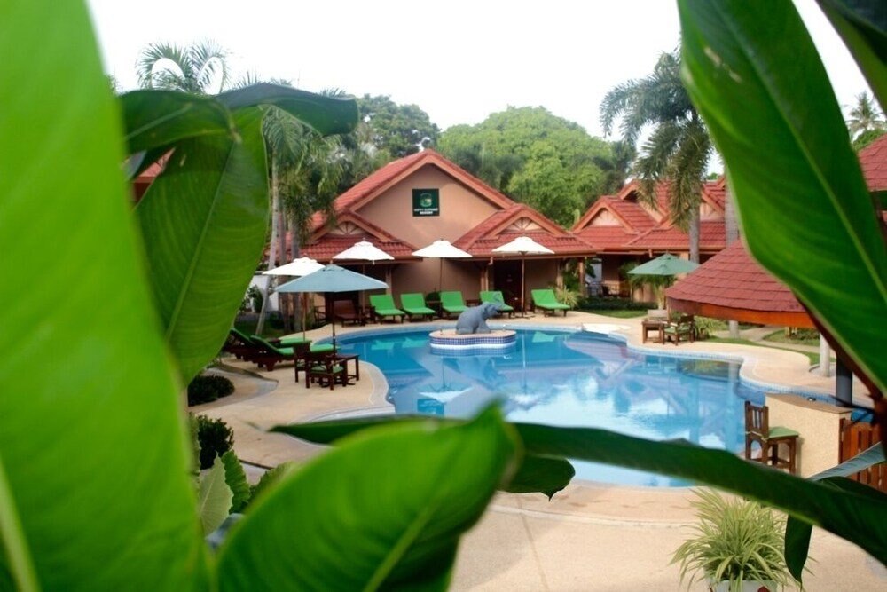 The Happy Elephant Resort - Tap to explore photos