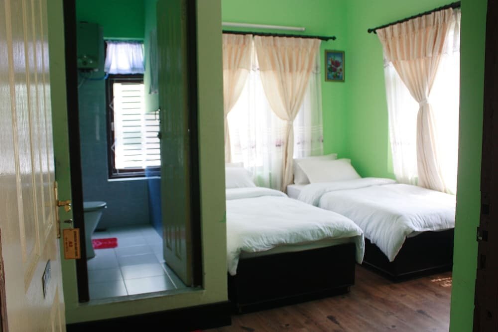 Dipankara Holiday Home Room Type - Deluxe Double or Twin Room, 2 Twin Beds, Garden View